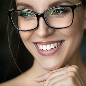 woman smiling after dental exam