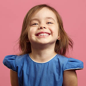 child smiling after dental exam