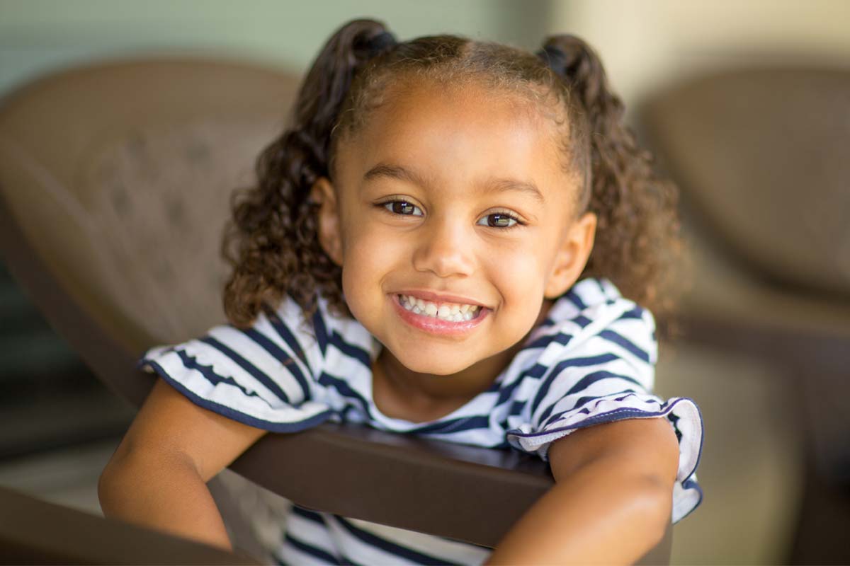 when-should-a-child-go-to-the-dentist (2) small girl smiling when should a child go to the dentist