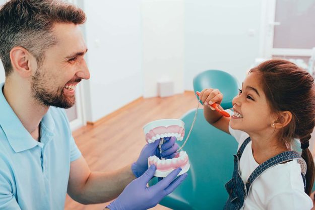 dental-anxiety child struggles with dental anxiety