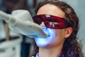 individual getting teeth whitening services