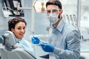 doctor explaining specialty dental services 