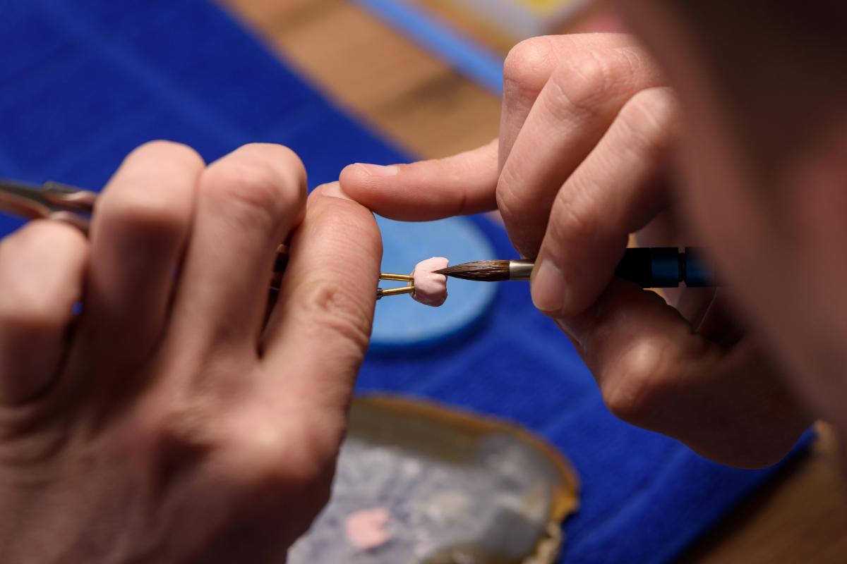 dentist working on dental implants