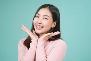 young woman after orthodontics